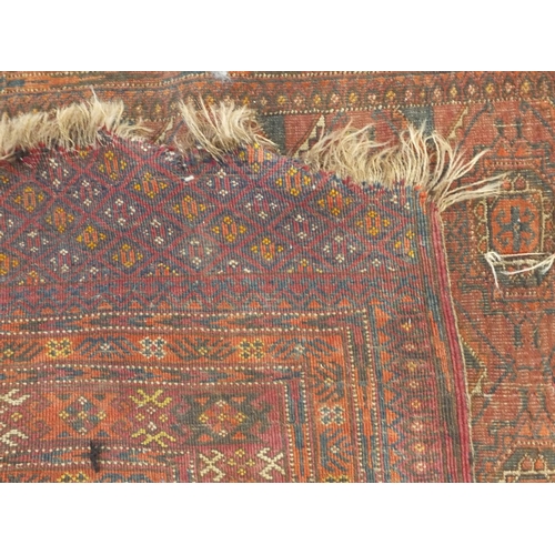 23 - Four assorted Middle Eastern rugs