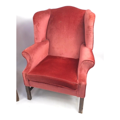 11 - Pair of mahogany framed wingback arm chairs, with pink upholstery