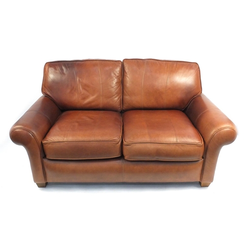 6 - Contemporary brown leather two seater settee, 168cm wide