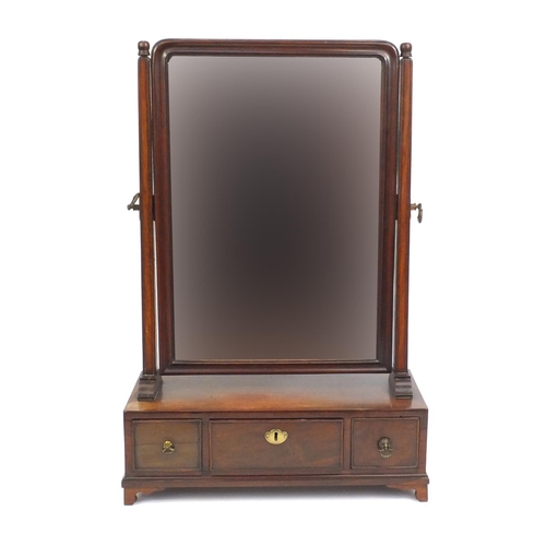 2050 - Georgian mahogany toilet mirror fitted with three drawers, 64cm high