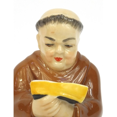 2072 - Royal Worcester porcelain monk candle snuffer, factory marks to the inside, 12cm high