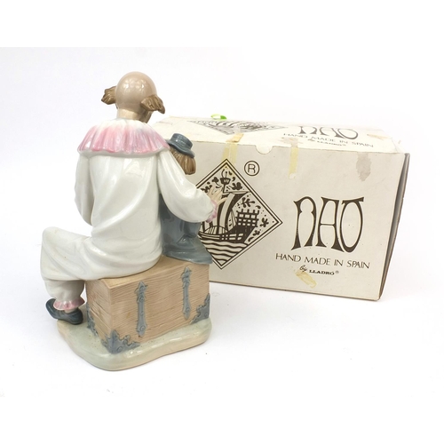 2096 - Boxed Nao figure group of a clown sat with a child playing a concertina, factory marks to the base, ... 