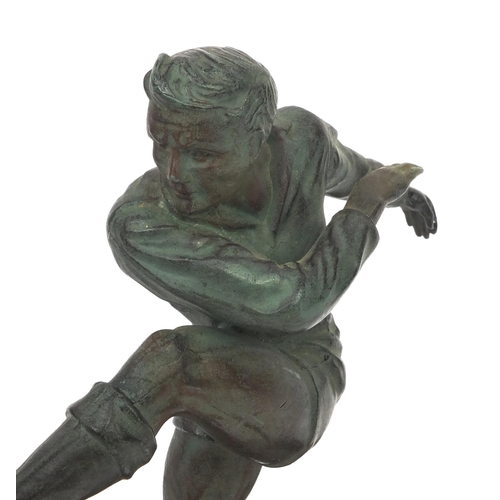 2113 - Art Deco style bronzed model of footballer raised on a black marble base, 20cm high