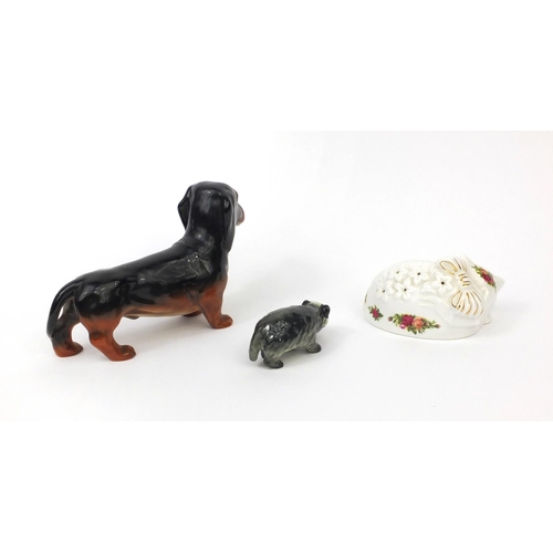 2069 - Collectable china comprising a Beswick dog, Goebal badger and Royal Albert Old Country Rose sleeping... 