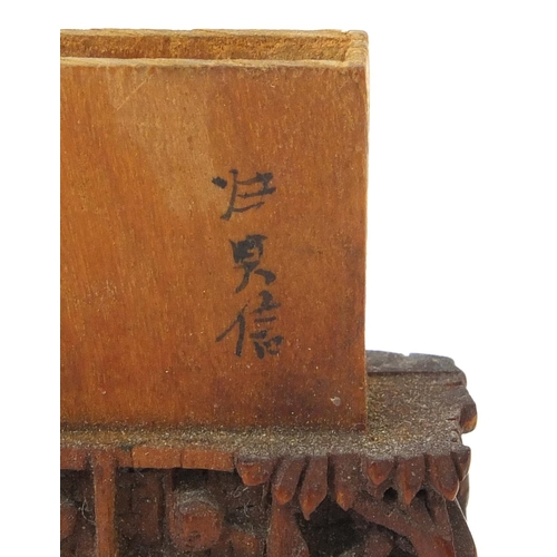 810 - Chinese cantonese sandalwood card case, profusely carved with figures amongst trees and pagodas, cha... 