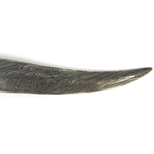 534 - Indian Mughal dagger with watered blade, the handle modelled as a mythical creature set with semi pr... 