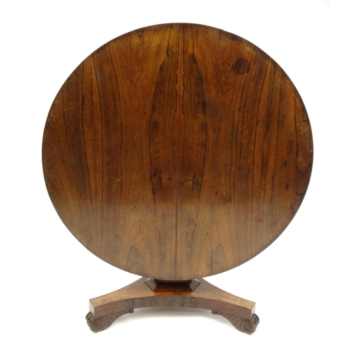 2026 - Victorian rosewood tilt top table with scrolled feet, 74cm high x 125cm in diameter