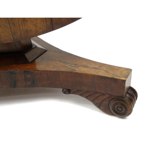 2026 - Victorian rosewood tilt top table with scrolled feet, 74cm high x 125cm in diameter