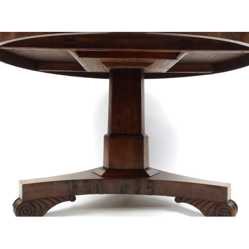 2026 - Victorian rosewood tilt top table with scrolled feet, 74cm high x 125cm in diameter