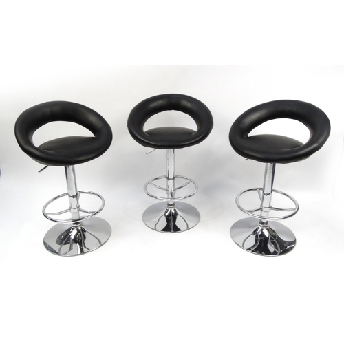 2034 - Three stylish chrome and leatherette adjustable breakfast stools