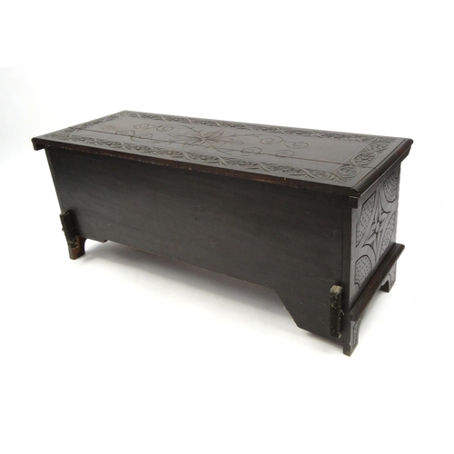 2020 - Carved oak plank chest, 52cm high x 120cm wide x 46cm deep