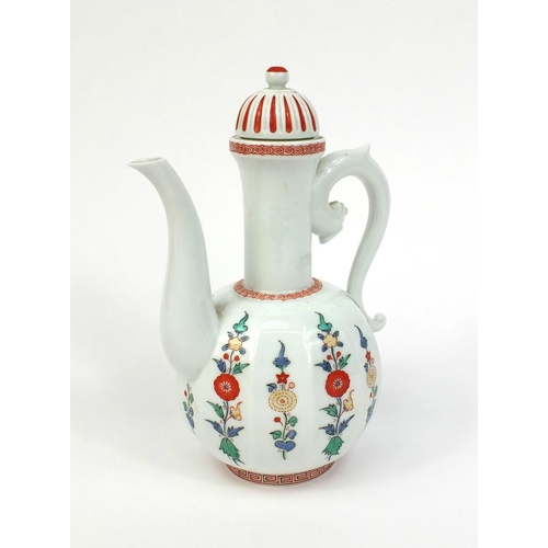 2074 - Japanese porcelain teapot hand painted with flowers, character marks to the base, 23cm high