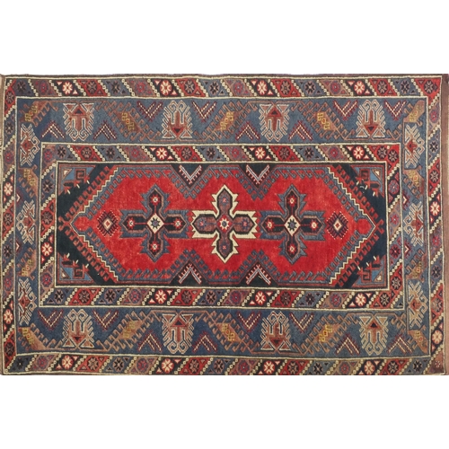 2013 - Rectangular Middle Eastern rug with geometric border and central field, 200cm x 127cm