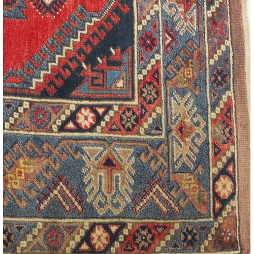 2013 - Rectangular Middle Eastern rug with geometric border and central field, 200cm x 127cm