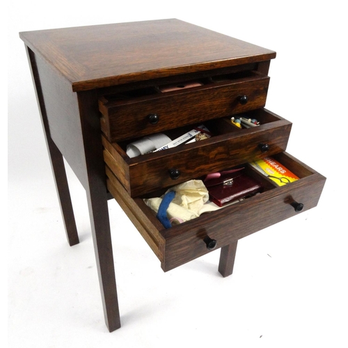 13 - Oak three drawer sewing table and contents, 70cm high x 43cm wide x 42cm deep