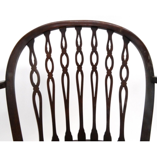 32 - Mahogany elbow chair with cane seat