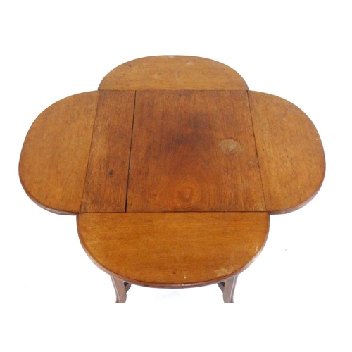 28 - Edwardian walnut drop leaf occasional table with under tier, 68cm high x 45cm square (folded)