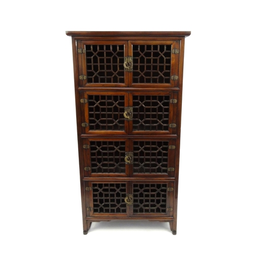 2030 - Oriental hardwood Chippendale design four shelf bookcase with fretwork doors, 162cm high x 86cm wide... 