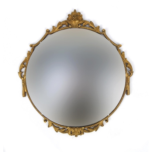 2047 - Circular ornate framed bevelled edge mirror with crest and basket of flower decoration, 59cm high