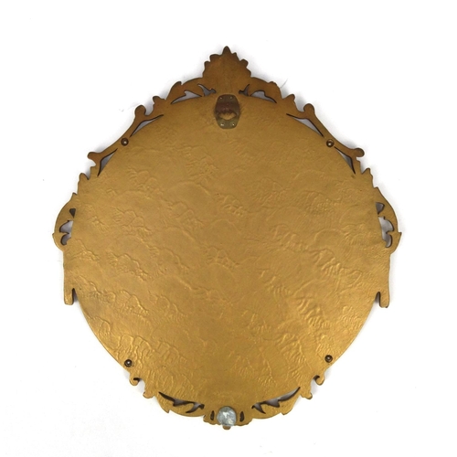 2047 - Circular ornate framed bevelled edge mirror with crest and basket of flower decoration, 59cm high