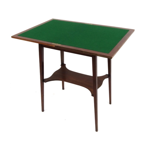 2023 - Edwardian inlaid mahogany folding card table with swivel top revealing a baize interior, raised on t... 