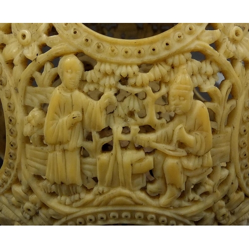 789 - Chinese Cantonese ivory layered puzzle ball on chain, the outer layer profusely carved with figures ... 