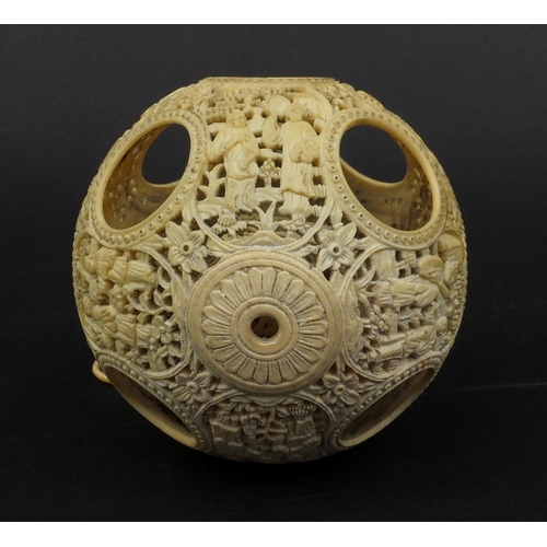 789 - Chinese Cantonese ivory layered puzzle ball on chain, the outer layer profusely carved with figures ... 