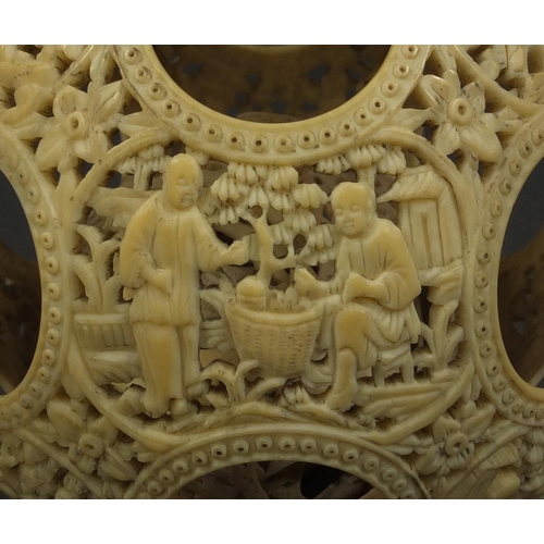 789 - Chinese Cantonese ivory layered puzzle ball on chain, the outer layer profusely carved with figures ... 