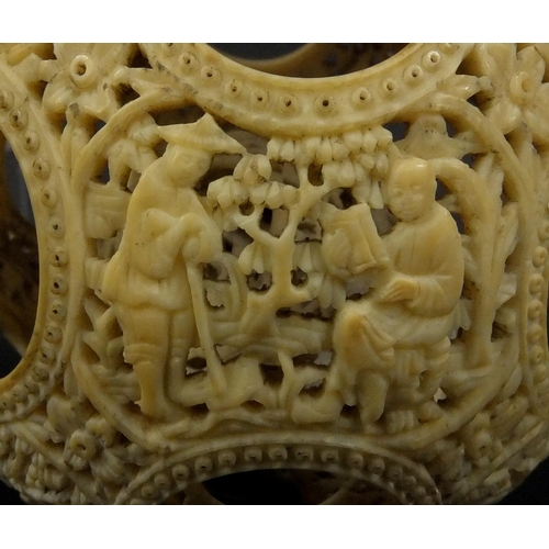 789 - Chinese Cantonese ivory layered puzzle ball on chain, the outer layer profusely carved with figures ... 