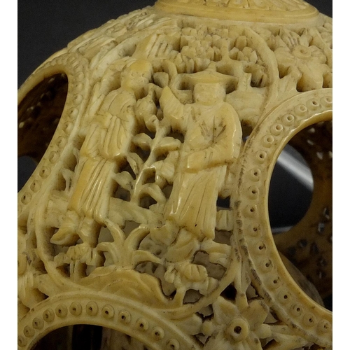 789 - Chinese Cantonese ivory layered puzzle ball on chain, the outer layer profusely carved with figures ... 