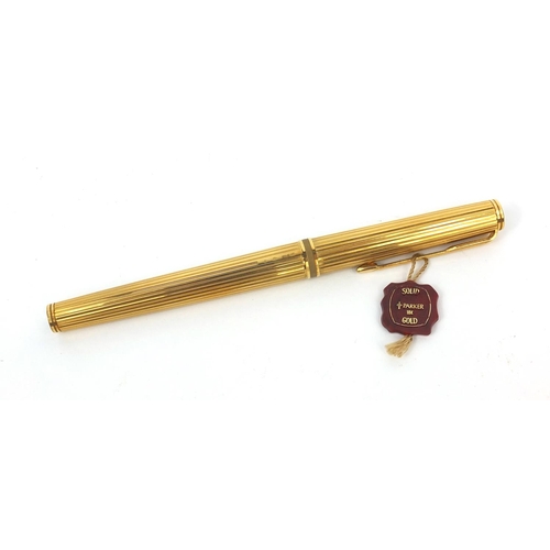 298 - Boxed 18ct gold cased Parker Premier fountain pen, with 18ct gold nib and accessories, the fountain ... 