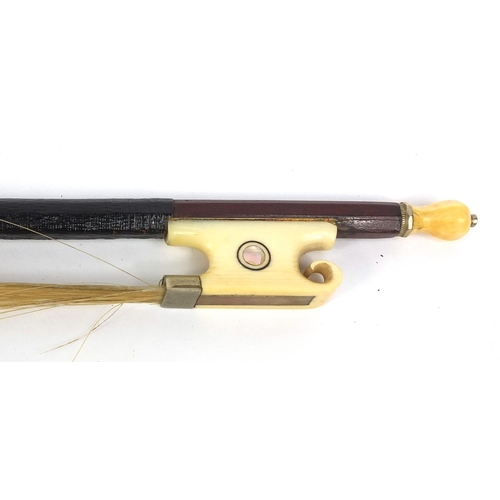 546 - Old wooden violin bow with ivory and Mother of Pearl frog and screw, 73cm long