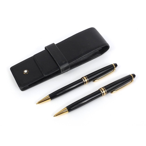 317 - Montblanc Meisterstuck Pix ball point pen and propelling pencil, together with a Montblanc black lea... 