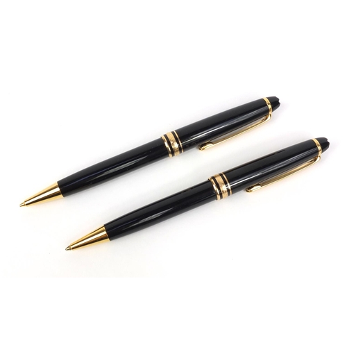 317 - Montblanc Meisterstuck Pix ball point pen and propelling pencil, together with a Montblanc black lea... 