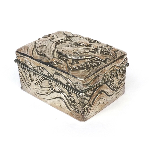 802 - Rectangular Japanese double skin silver box the hinged lid and body profusely embossed with three fi... 