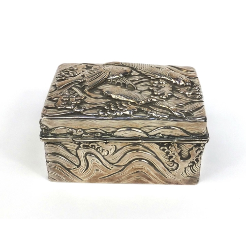 802 - Rectangular Japanese double skin silver box the hinged lid and body profusely embossed with three fi... 