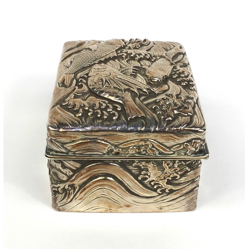 802 - Rectangular Japanese double skin silver box the hinged lid and body profusely embossed with three fi... 