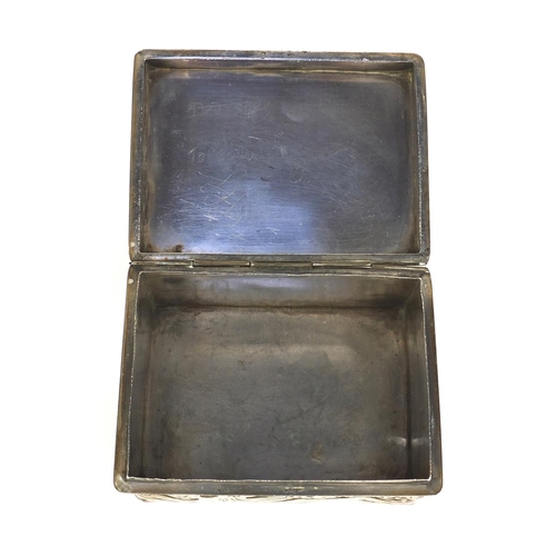 802 - Rectangular Japanese double skin silver box the hinged lid and body profusely embossed with three fi... 