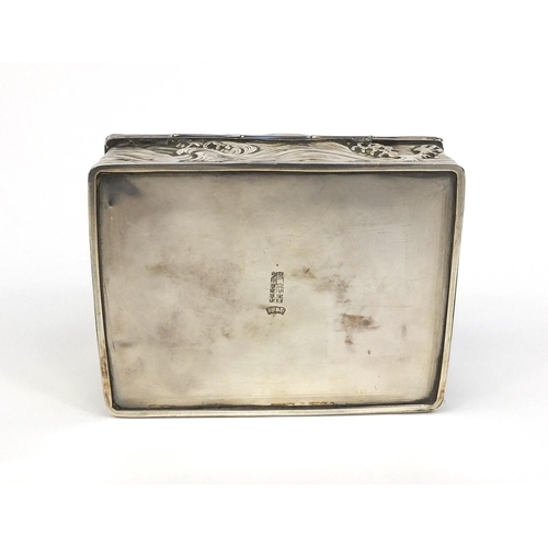 802 - Rectangular Japanese double skin silver box the hinged lid and body profusely embossed with three fi... 