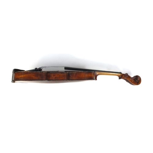 544 - 19th century wooden violin with one piece back, together with bow and fitted stagg case, the violin ... 