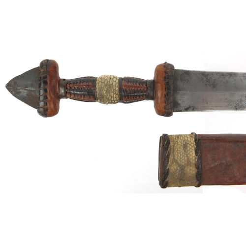 537 - Middle Eastern dagger with snake skin and leather sheath and grip, 28cm long