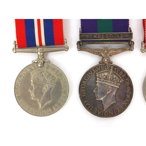 579 - British Military medals comprising a George VI General Service medal with Palestine bar and original... 