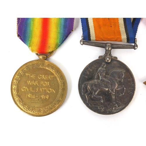 556 - British Military interest World War I trio comprising a Victory medal, 1914-18 war medal and 1914-15... 