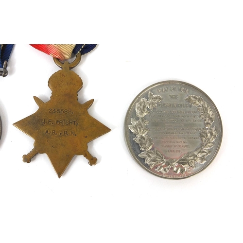 556 - British Military interest World War I trio comprising a Victory medal, 1914-18 war medal and 1914-15... 