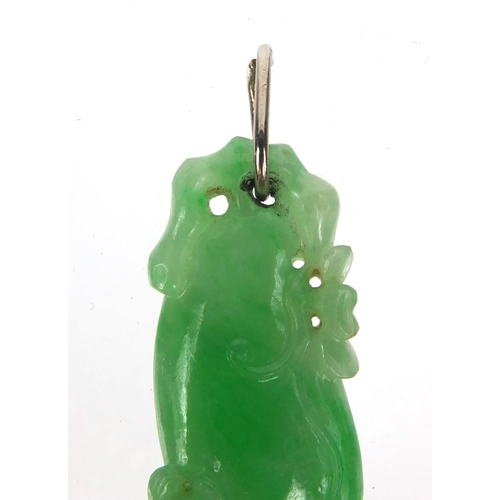 804 - Chinese green jade pendant carved with a dragon, 4cm high, approximate weight 8.1g