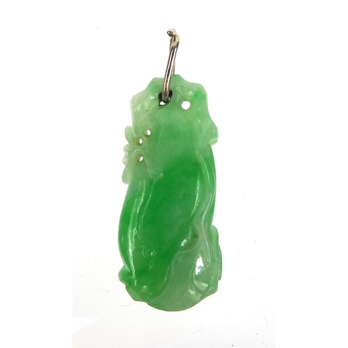 804 - Chinese green jade pendant carved with a dragon, 4cm high, approximate weight 8.1g