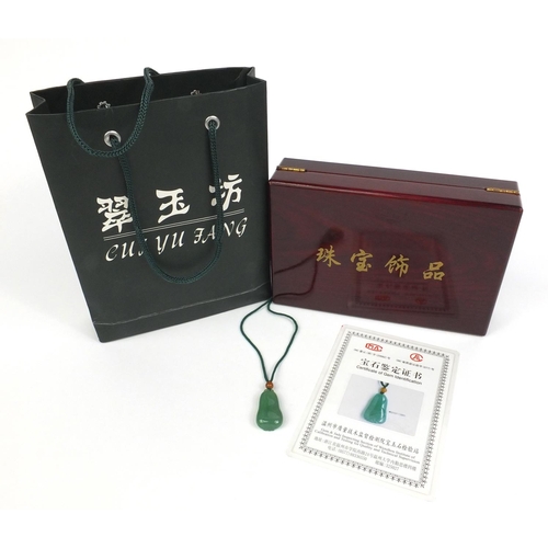 806 - Chinese green jade carved pendant on necklace with certificate of gem identification, box and bag, t... 