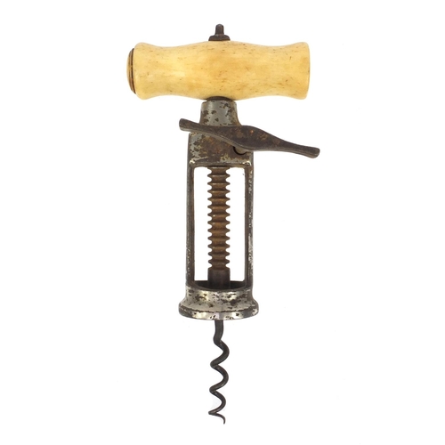 14 - 19th century steel open framed corkscrew with cast iron ratchet sidearm and  bone handle, 19cm when ... 