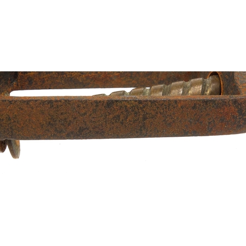 35 - Cast iron wooden handled corkscrew, 18cm when closed