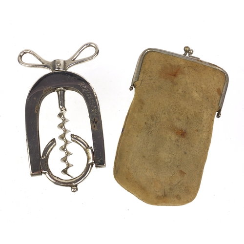 20 - Bonsa corkscrew Reg. Mark to back, housed in a kid skin pouch, 10cm high when closed